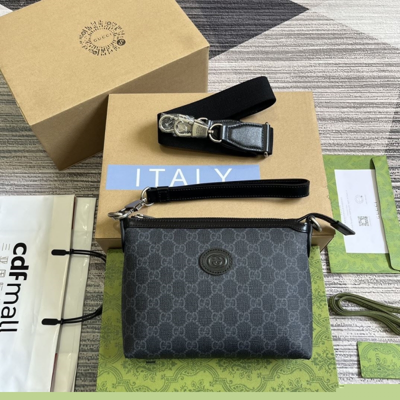 G*u*i clutch bags